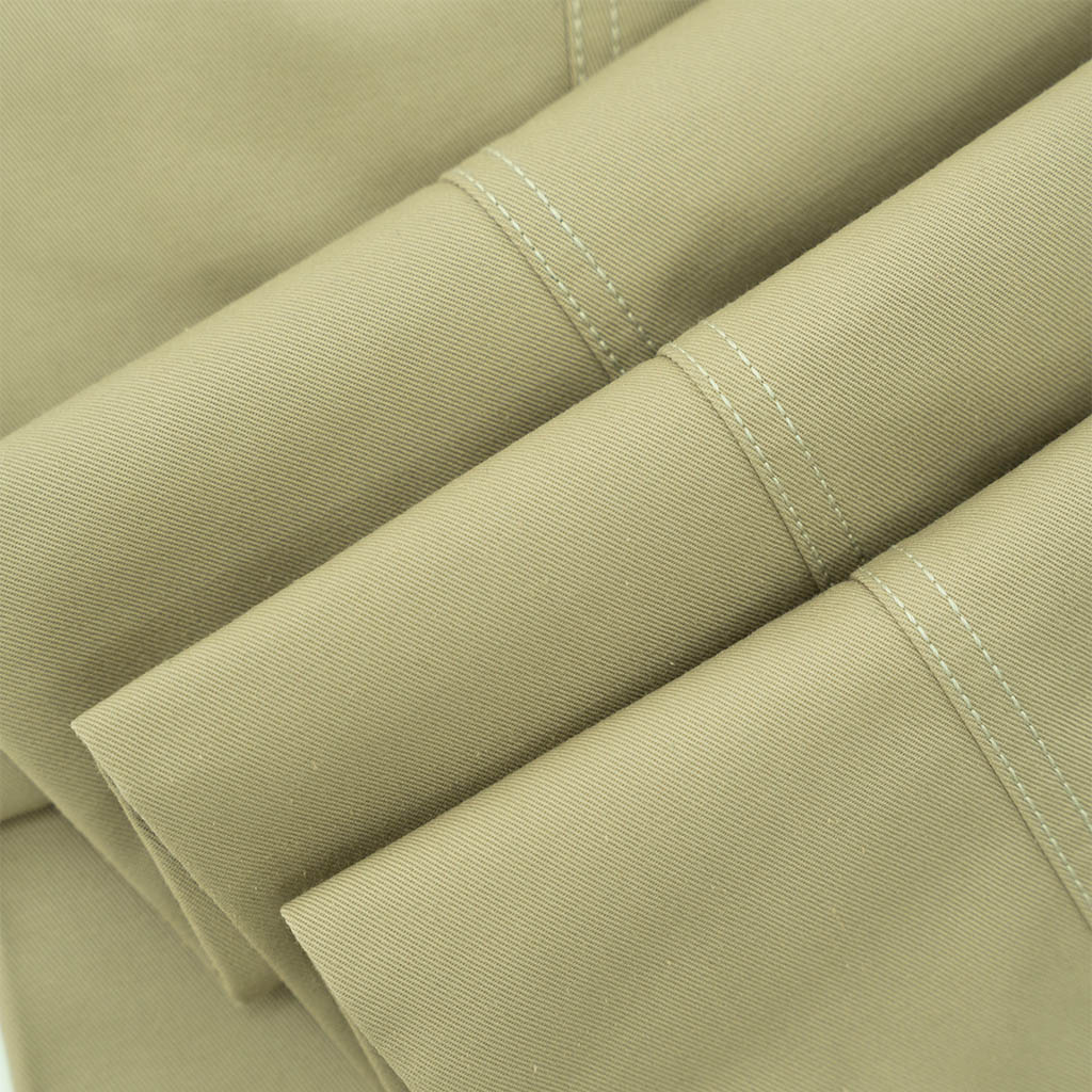 Bộ công sở nam trung niên: áo sơ mi cộc tay vải sợi tre tím nhạt và quần kaki 2 ly vàng