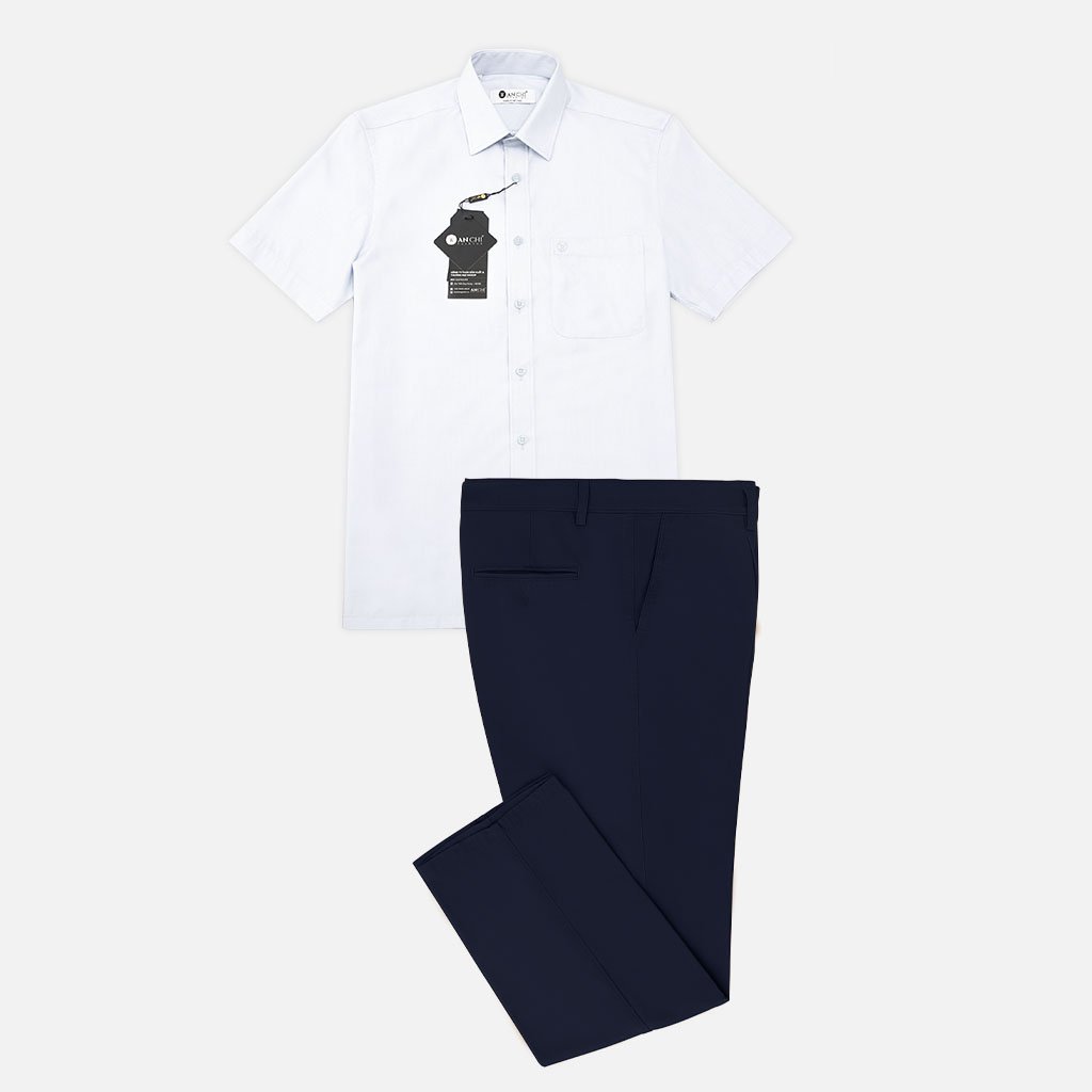 Bộ thời trang trung niên gồm áo sơ mi nam vải sợi tre màu trắng và quần tây kaki 2 ly vải thô màu xanh đen