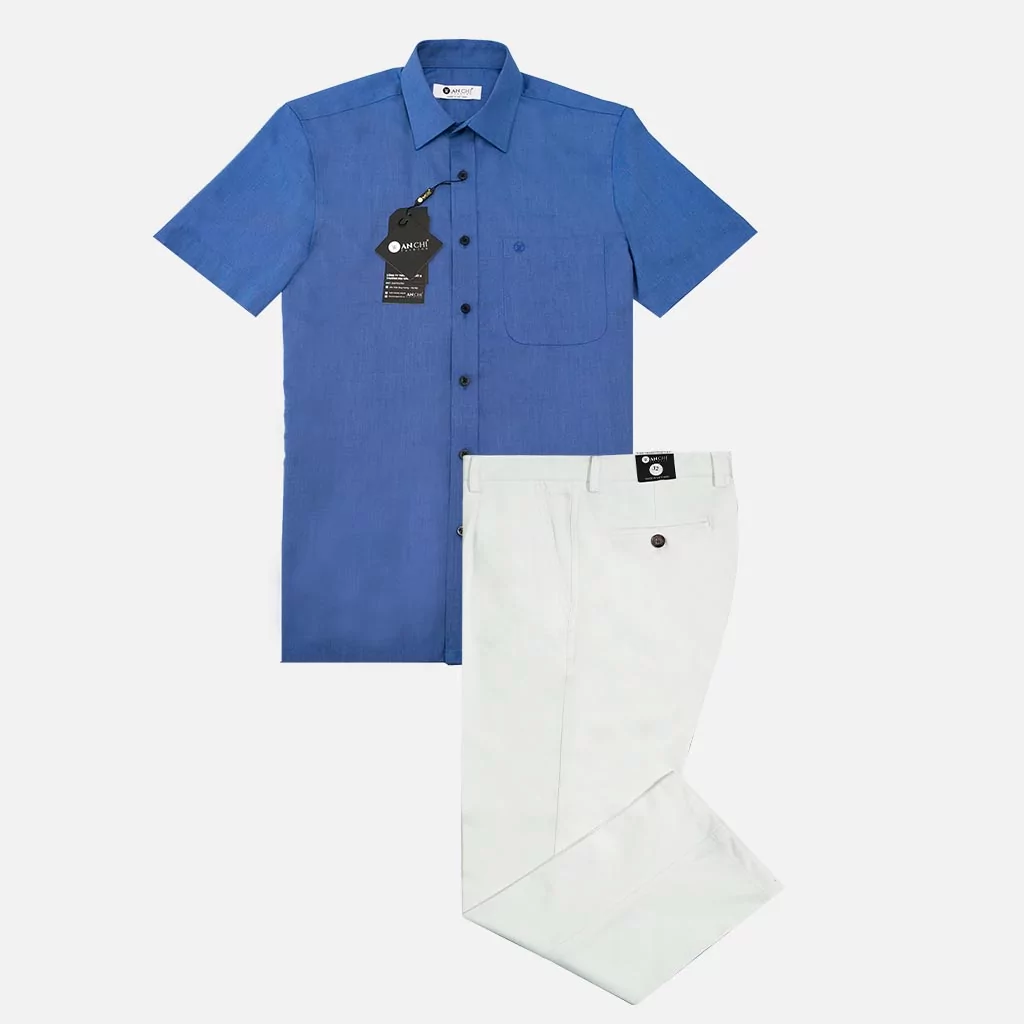 Bộ đồ Âu nam trung niên gồm áo sơ mi sợi tre xanh biển và quần kaki cotton trắng